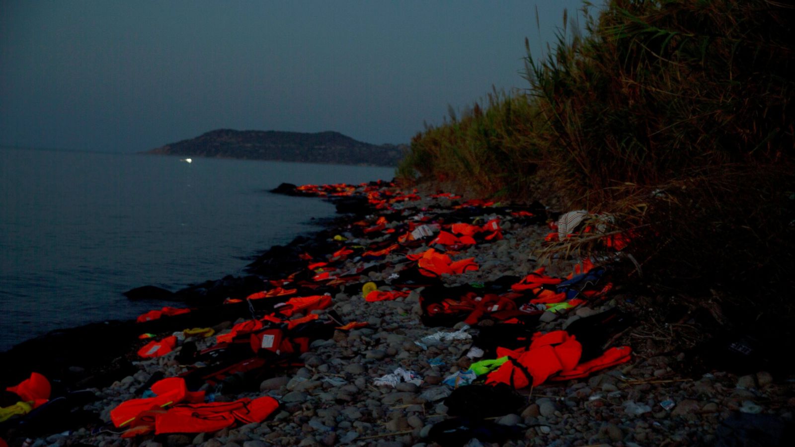 Greek Coast Guard Searches for 26 Missing Migrants