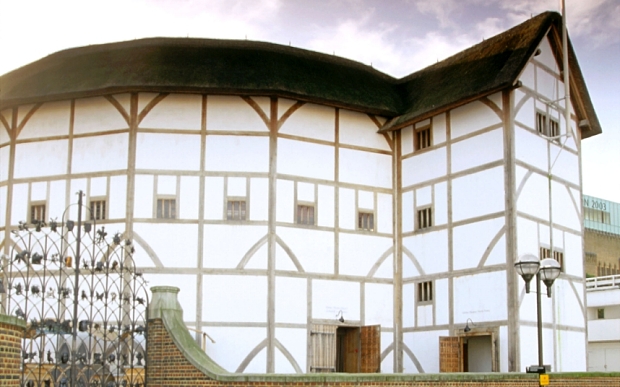Shakespeare's Globe theatre on the banks of the Thames river in London.