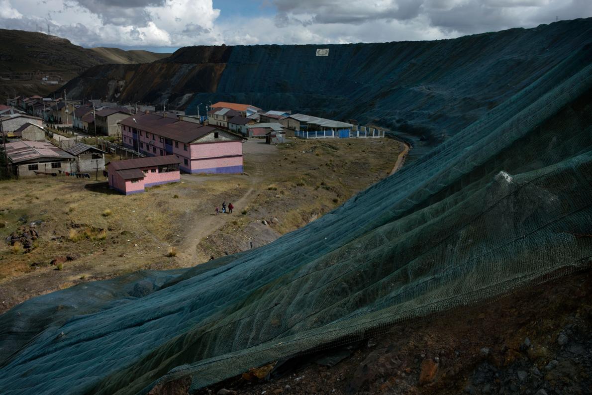 High in the Andes, A Mine Eats a 400-Year-Old City