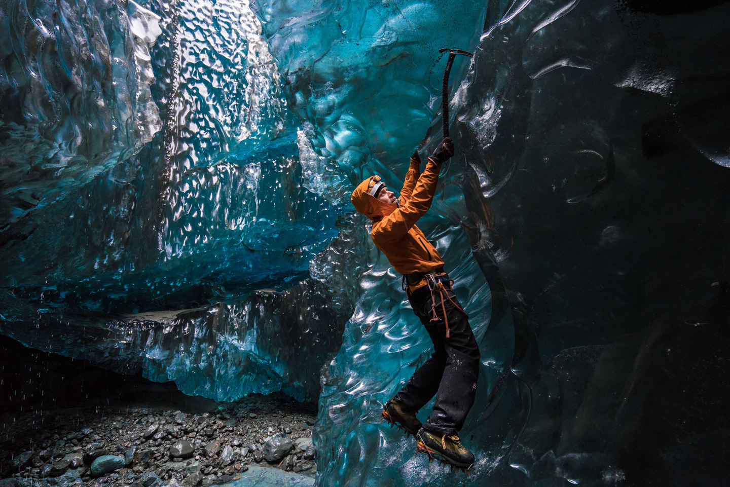 EMBARGOED FOR USE ONLINE AND PRINT UNTIL 00:01 26/11/15Guide Einar Runar Sigurdsson is seen ice climbing inside the 'Waterfall Cave' Photographer explores Vatnaj&ouml;kull glacie using Sony's back-illuminated full-frame sensor, Iceland - 25 Nov 2015 *Full story: http://www.rexfeatures.com/nanolink/rm22 Photographer Mikael Buck with assistance from renowned local Icelandic guide Einar Runar Sigurdsson, explored the frozen world of Vatnaj&ouml;kull glacier in Iceland using Sony's world first back-illuminated full-frame sensor, which features in the 7R II camera. His images were taken without use of a tripod or any image stitching techniques in photoshop. This was made possible through Sony's new sensor technology, allowing incredibly detailed low-light hand held photography. Previously images this detailed would have required carrying bulky equipment to the caves, some of which can require hiking and climbing over a glacier for up to two hours to to access. The images were taken without the use of any external sources - just the natural light that filters through the ice caves.  (Rex Features via AP Images)