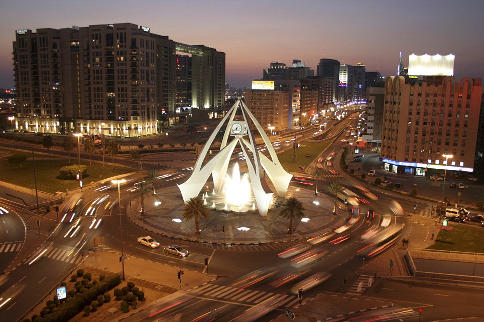 Dubai, United Arab Emirates --- A view of clock tower in Deira, Dubai. --- Image by &copy; Farhad Berahman/arabianEye/Corbis