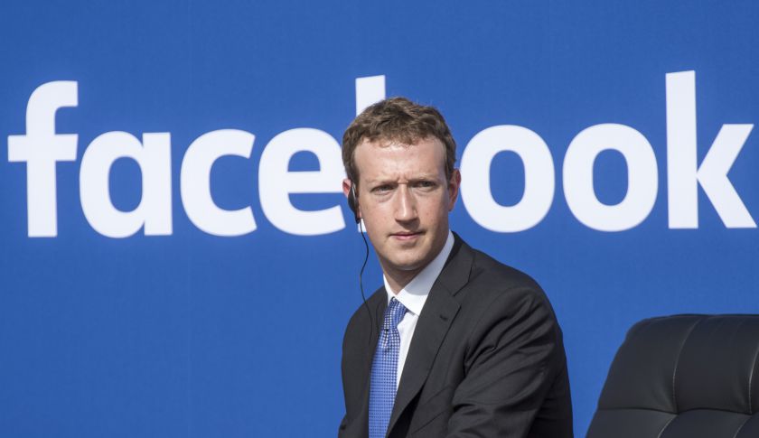 Mark Zuckerberg, chief executive officer of Facebook Inc., listens as Narendra Modi, India's prime minister, not pictured, speaks during a town hall meeting at Facebook headquarters in Menlo Park, California, U.S., on Sunday, Sept. 27, 2015. Prime Minister Modi plans on connecting 600,000 villages across India using fiber optic cable as part of his 