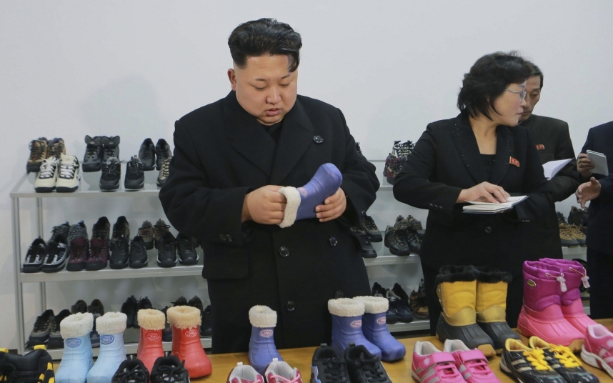 North Korean leader Kim provides field guidance to the Ryuwon Shoes Factory in this undated photo released by North Korea's KCNA in Pyongyang...North Korean leader Kim Jong Un (L) provides field guidance to the Ryuwon Shoes Factory in this undated photo released by North Korea's Korean Central News Agency (KCNA) in Pyongyang January 21, 2015.  REUTERS/KCNA (NORTH KOREA - Tags: POLITICS BUSINESS) ATTENTION EDITORS - THIS PICTURE WAS PROVIDED BY A THIRD PARTY. REUTERS IS UNABLE TO INDEPENDENTLY VERIFY THE AUTHENTICITY, CONTENT, LOCATION OR DATE OF THIS IMAGE. FOR EDITORIAL USE ONLY. NOT FOR SALE FOR MARKETING OR ADVERTISING CAMPAIGNS. THIS PICTURE IS DISTRIBUTED EXACTLY AS RECEIVED BY REUTERS, AS A SERVICE TO CLIENTS. NO THIRD PARTY SALES. NOT FOR USE BY REUTERS THIRD PARTY DISTRIBUTORS. SOUTH KOREA OUT. NO COMMERCIAL OR EDITORIAL SALES IN SOUTH KOREA