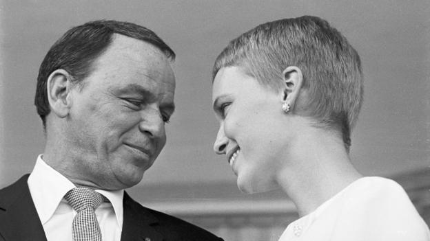 19 Jul 1966, Paradise, Las Vegas, Nevada, USA --- Original caption: Mr. and Mrs. Frank Sinatra exchange fond glances following their wedding on July 19, 1966, at the Sands Hotel in Las Vegas. --- Image by &copy; Bettmann/CORBIS