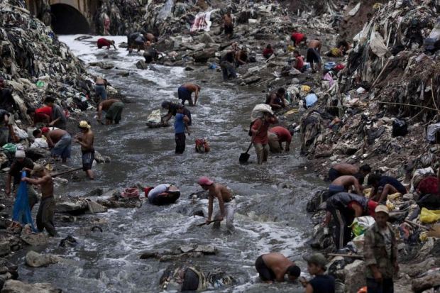 Guatemala’s toxic river of trash that is attracting thousands of ‘miners’ risking life in search of gold and jewellery