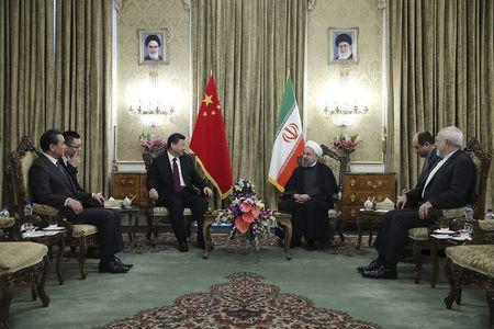 Iranian President Hassan Rouhani meets Chinese President Xi Jinping in Tehran, Iran January 23, 2016. REUTERS/President.ir/Handout via Reuters