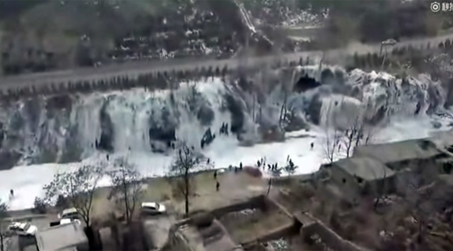 Elsa’s dream: Frozen waterfall the width of football pitch captured in China