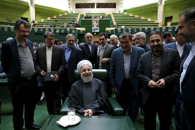Iranian President Hassan Rouhani attends a session at the Iranian parliament to present the draft budget for the next Iranian fiscal year in Tehran, January 17, 2016. REUTERS/President.ir/Handout