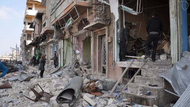 Syria conflict: Homs and Damascus blasts kill more than 100
