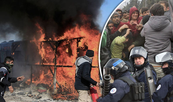 CALAIS BURNS: Migrants in violent clashes with police over Jungle camp demolition