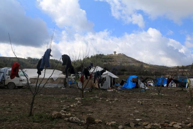 A general view shows tents housing internally displaced people in the town of Khirbet Al-Joz, in Latakia countryside, near the Syrian-Turkish border, Syria, February 7, 2016.  REUTERS/Ammar Abdullah