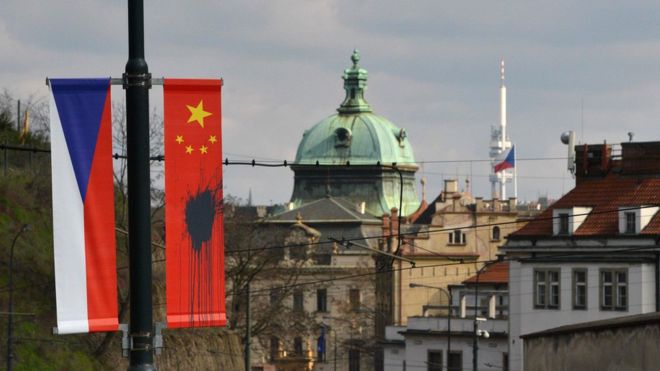 Chinese flags defaced in Prague ahead of Xi visit
