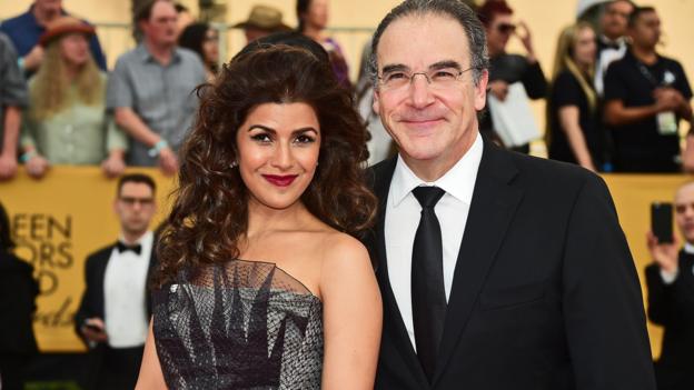 Actors Nimrat Kaur (L) and Mandy Patinkin arrive for the 21st Annual Screen Actors Guild Awards, January 25, 2015 at the Shrine Auditorium in Los Angeles, California.  AFP PHOTO / FREDERIC J. BROWN        (Photo credit should read FREDERIC J. BROWN/AFP/Getty Images)