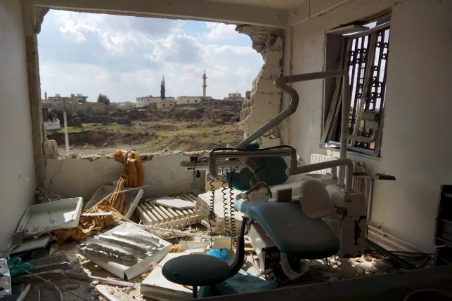 A view shows a damaged clinic after airstrikes by pro-Syrian government forces in the rebel held al-Ghariyah al-Gharbiyah town, in Deraa province, Syria February 11, 2016. REUTERS/Alaa Al-Faqir