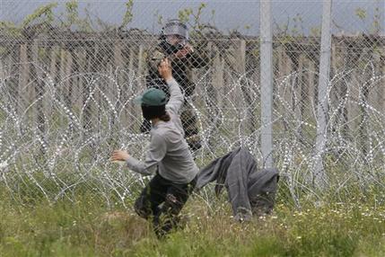 THE LATEST: Croatia, Albania join to block migrants