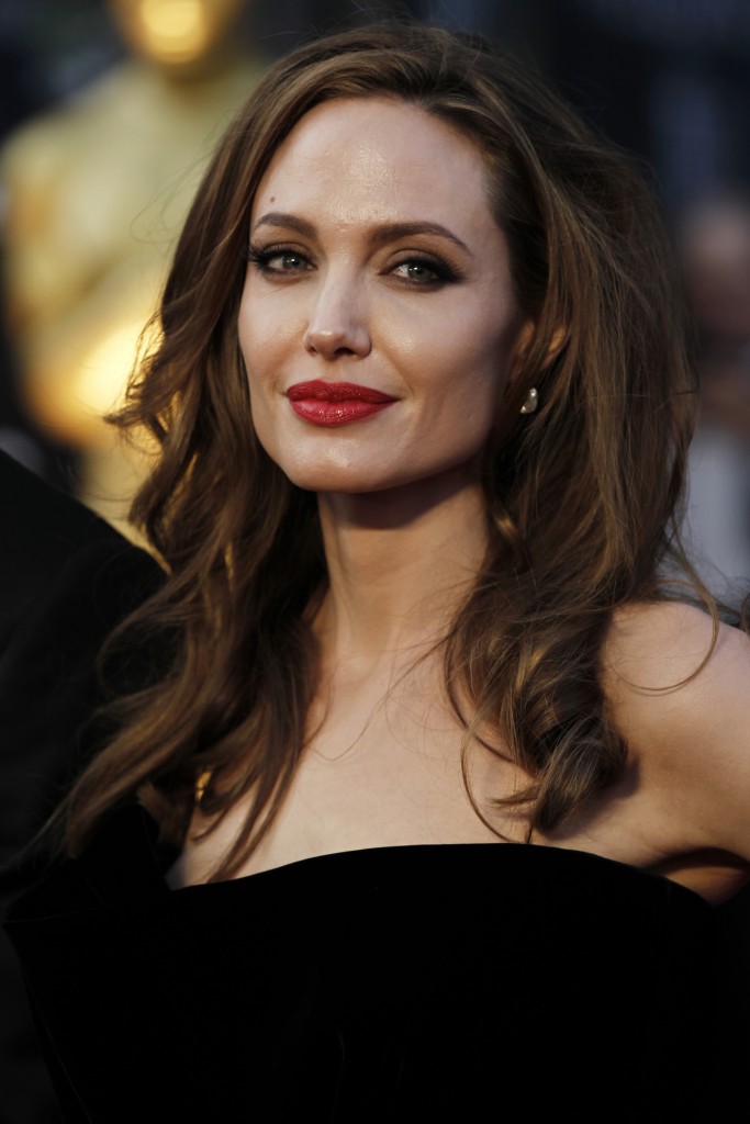Angelina Jolie arrives before the 84th Academy Awards on Sunday, Feb. 26, 2012, in the Hollywood section of Los Angeles. (AP Photo/Matt Sayles)