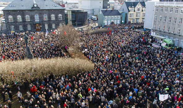 Protestors pelt Icelandic parliament with eggs, yoghurt and BANANAS in call for PM to quit