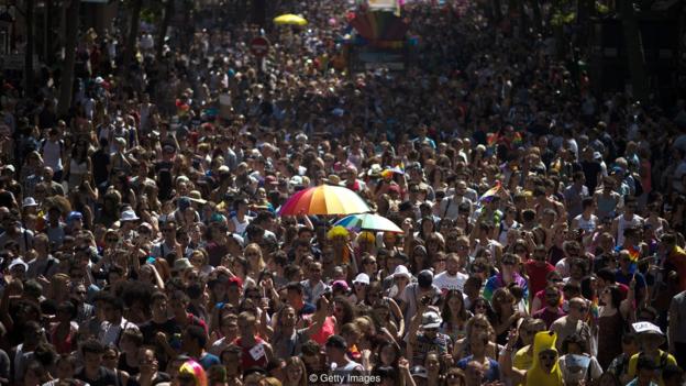 People take part in the annual Gay Pride homosexual, bisexual and transgender visibility march on June 27, 2015 in Paris. AFP PHOTO / MARTIN BUREAU        (Photo credit should read MARTIN BUREAU/AFP/Getty Images)