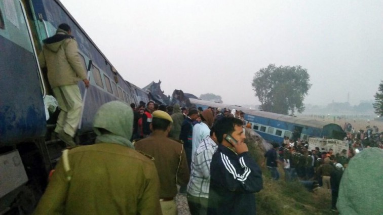 At least 96 dead after train derails with many more trapped