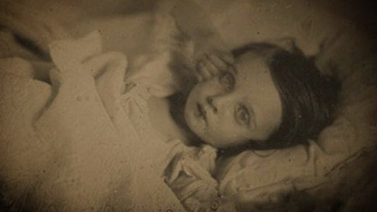 Unsettling Victorian portraits of dead children propped up to look alive