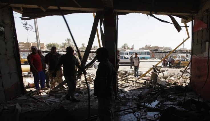 Car bomb kills at least 12 and injures dozens in eastern Baghdad