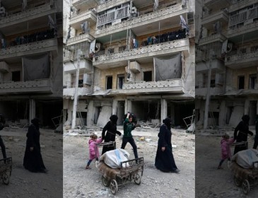 In midst of Aleppo wreckage, a Syrian family returns home
