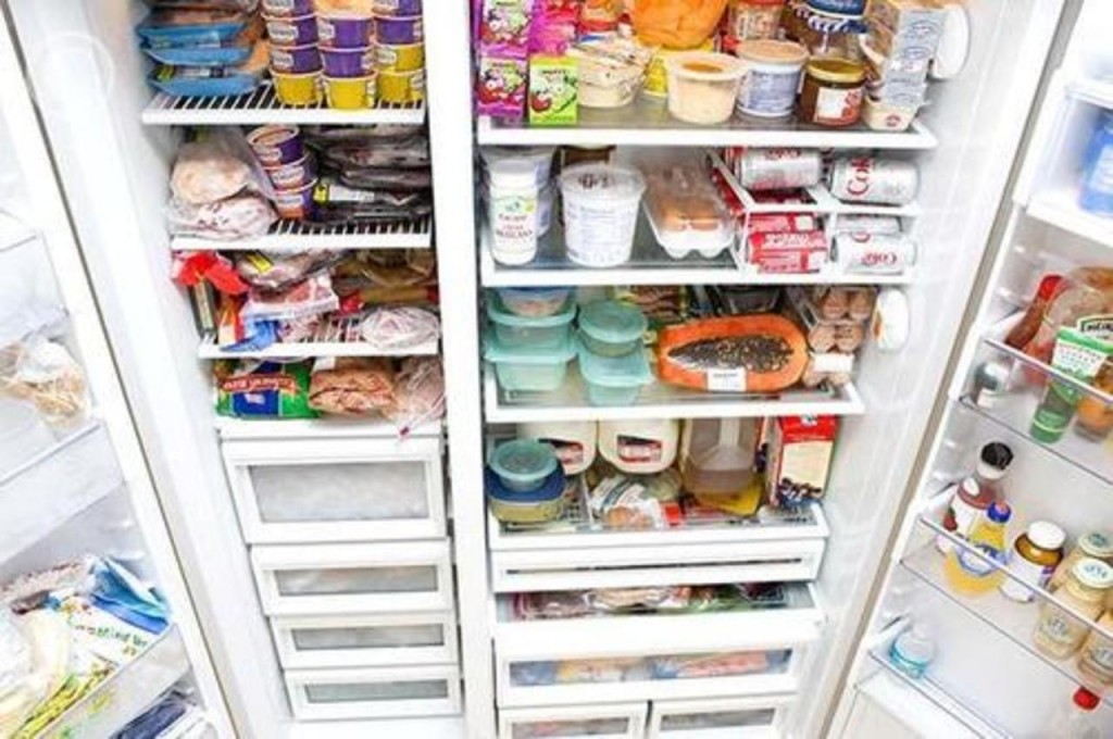 refrigerator_filled_with_assorted_food_items_gdr12834908