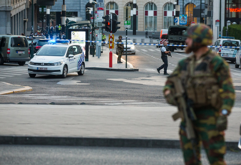 epa06039847 An armed soldier stands guard as police activies goes on outside of the Brussels Central Station after a neutralized terrorist attack attempt, in Brussels, Belgium, 20 June 2017. According to Belgian media, police shot a suspect wearing an explosive belt at the Brussels Central Station. Belgian police also confirmed there was a small explosion in the Brussels Central Station, but said there are not much damage done and situation is under control. The cause of the explosion is unknown.  EPA/STEPHANIE LECOCQ